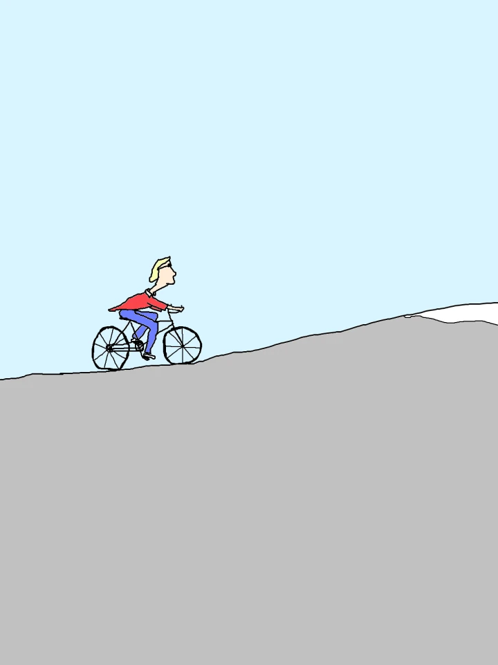 A small blond cyclist in a red top and blue trousers pedals up a grey slope, with a broad expanse of pale blue sky above.